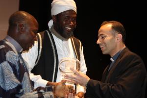Imam Ashafa and Pastor James receive the 2009 Spiritual Solidarity Award from Father Daou (Photo:  Adyan)