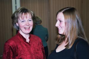 Concert pianist Penelope Thwaites (left) speaks with a guest at the Greencoat Forum in London 