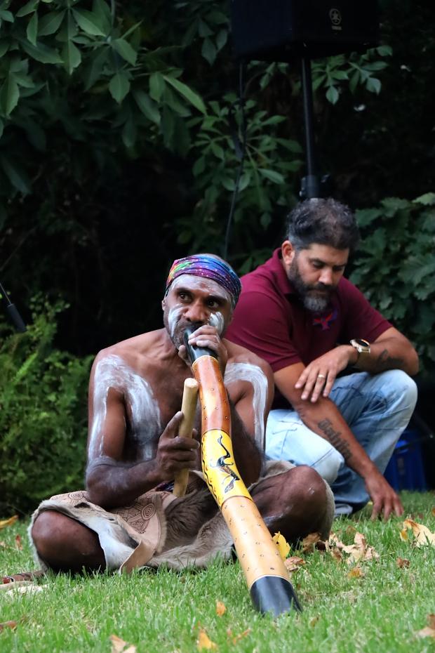 Musician Amos Roach on the didgeridoo. / Credit: Alex Childs