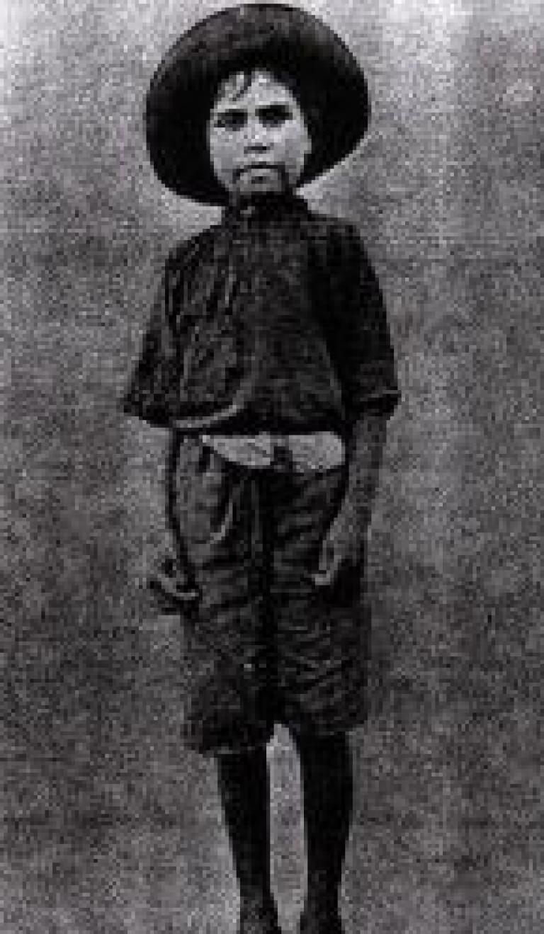 An Aboriginal boy at an institution in Alice Springs - a photograph on the 'Stolen Generations' memorial