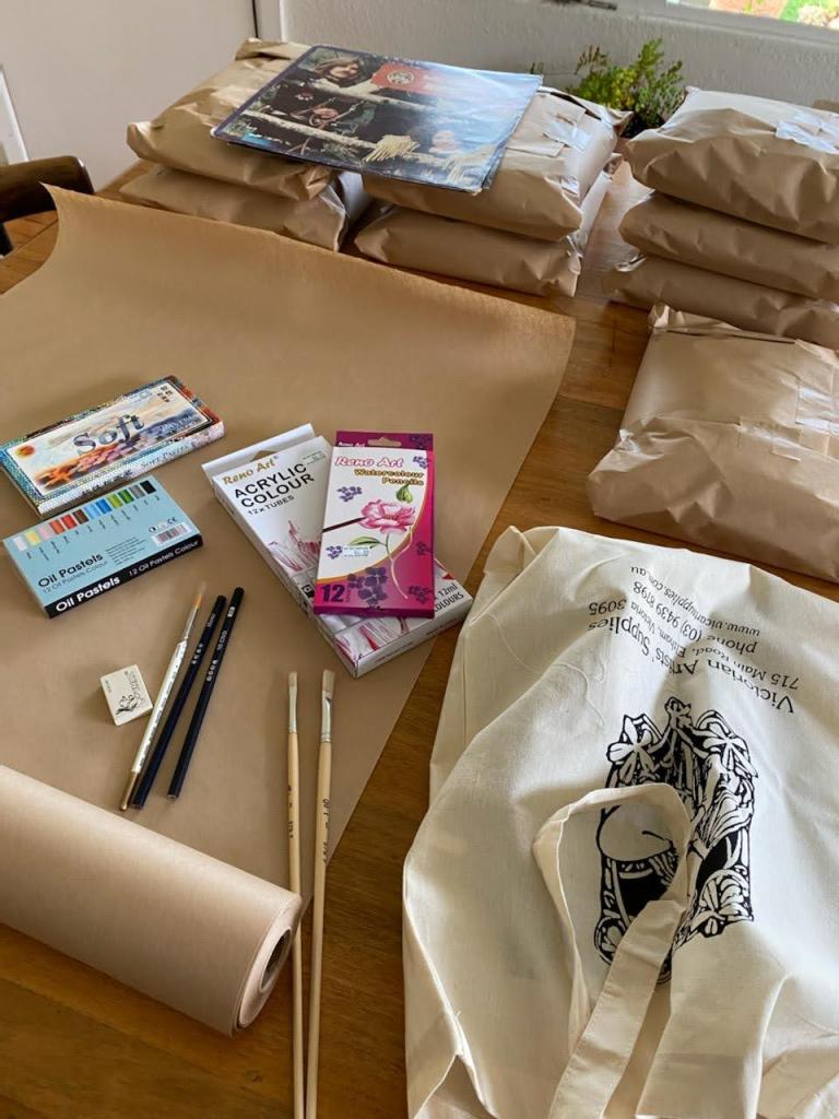 Art supply packs being prepared to be sent to participants.
Photograph by Alex Childs